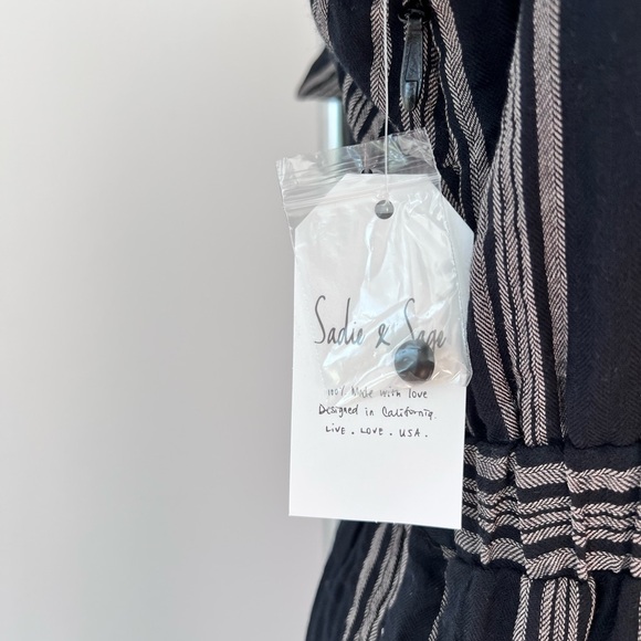 Sadie & Sage Black and Cream Jumpsuit with Peekaboo Detail and Front Tie Striped - Picture 6 of 7